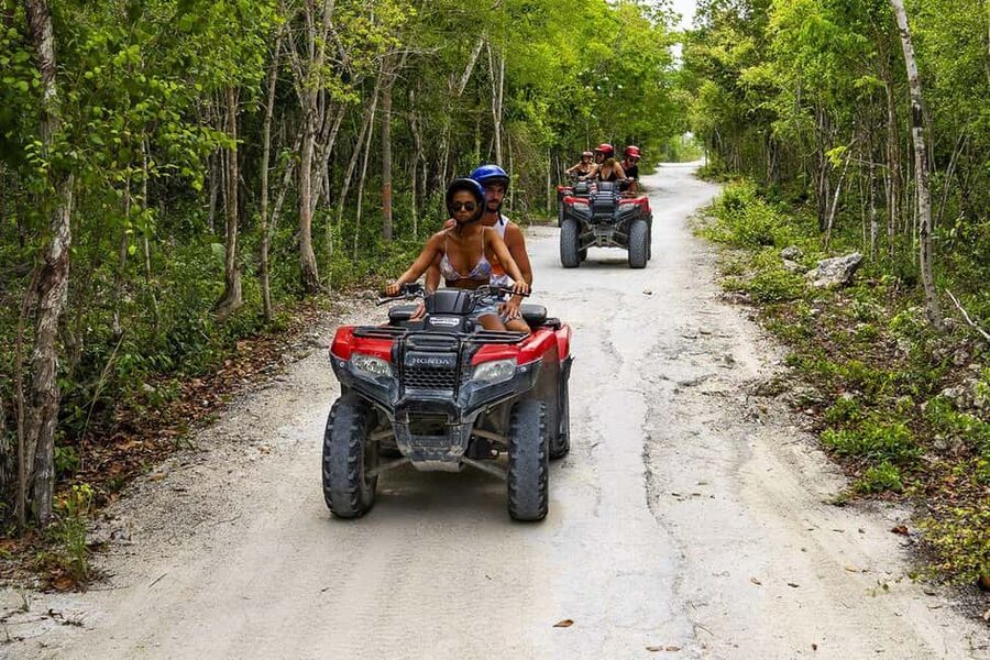 Cozumel Shore Excursion: ATV Jade Cavern & Tequila Tasting - Riding an ATV through the jungle