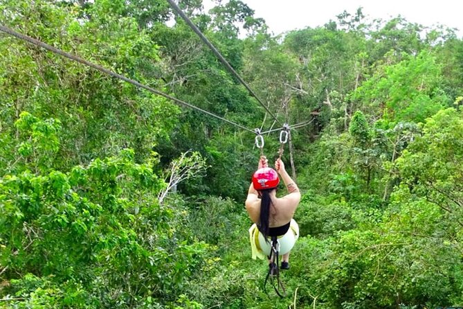 Family ATV Cenote Five Zip Lines Photos Taco Lunch Tequila Taste - A 30-minute ATV ride through the jungle