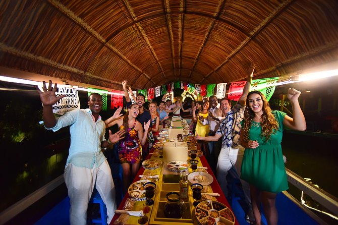 Xoximilco Ticket: Boat Fiesta, Traditional Tasting & Tequila Bar - Arriving near Puerto Morelos for the 7 pm start
